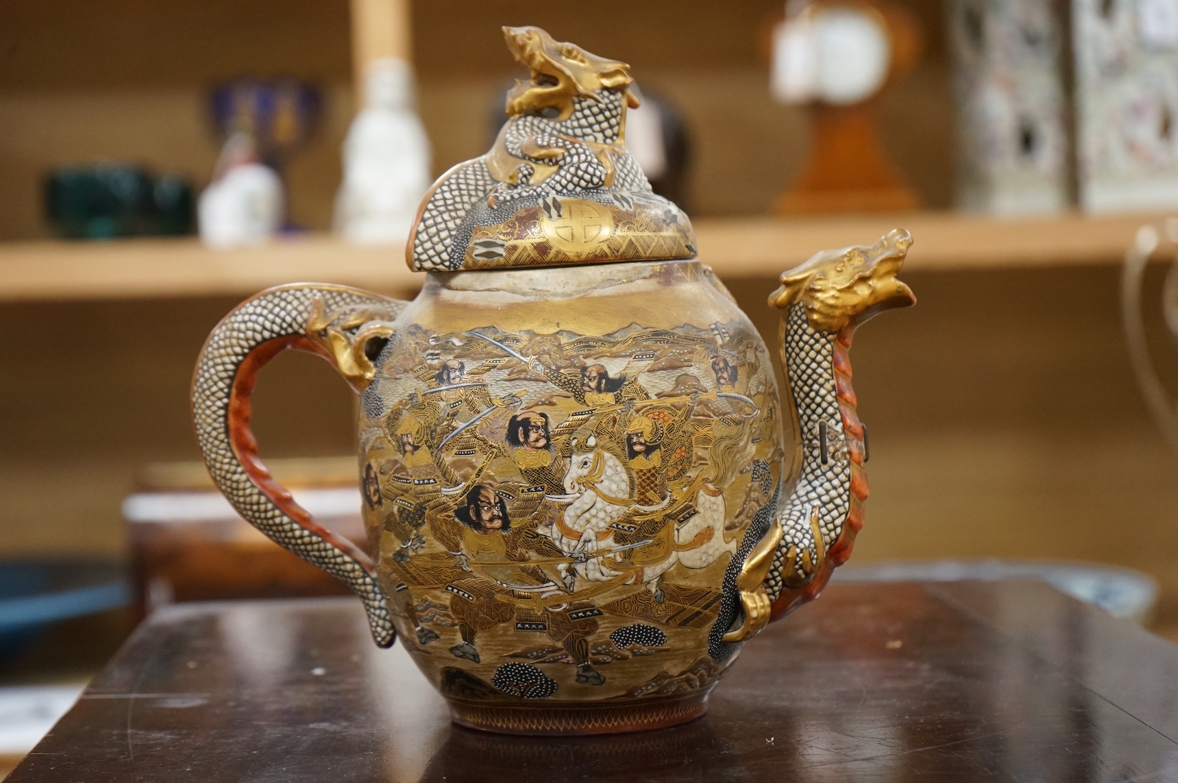 A Japanese Satsuma teapot dragon, Meiji period, 23cm high